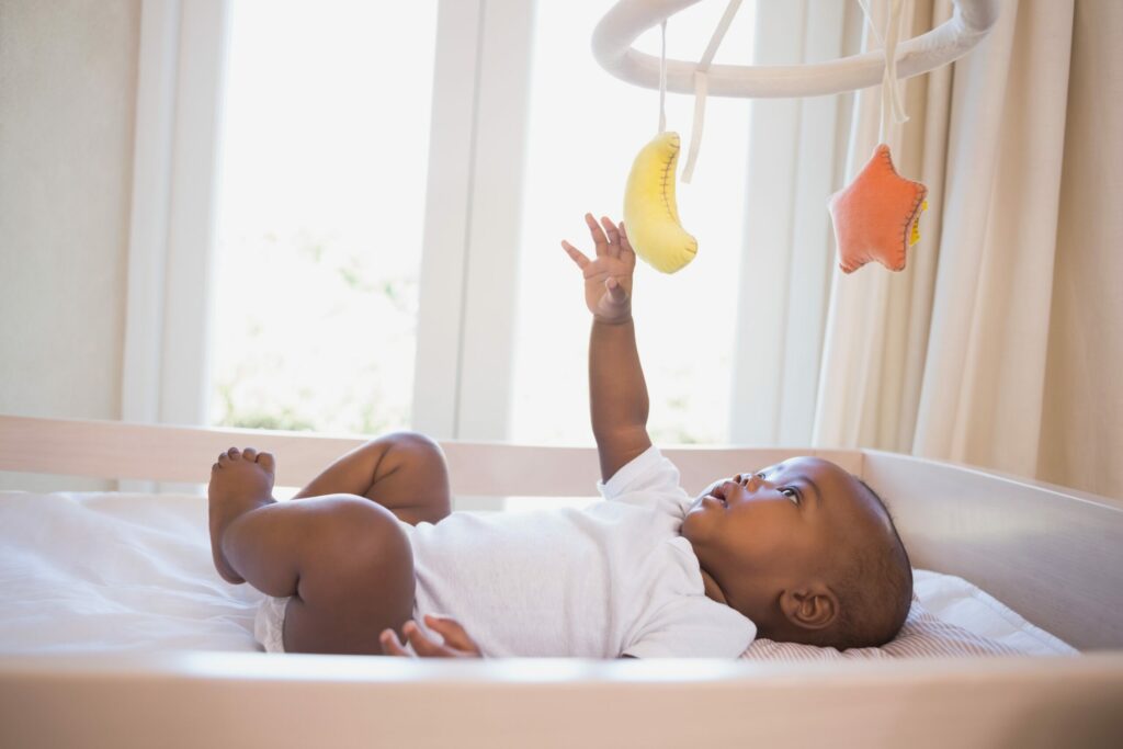 child laying in crib