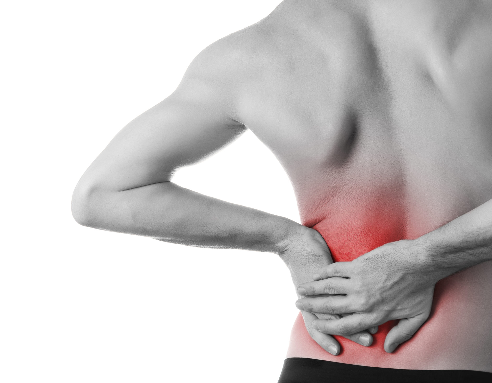 Rear view of a young man holding his back in pain, isolated on w