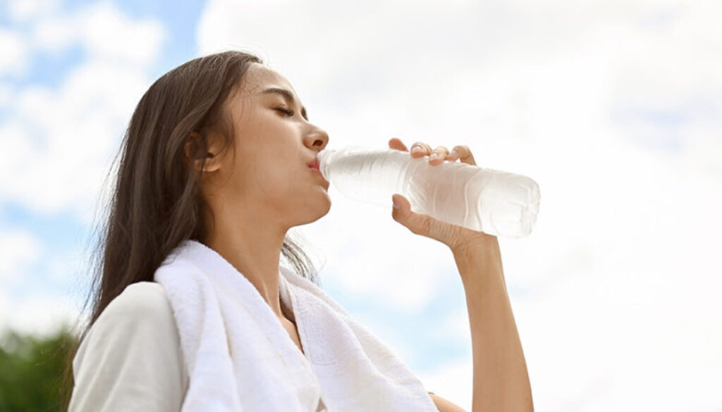 A woman drinking water