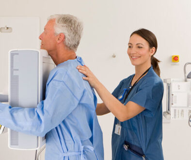 Xrays A doctor giving a patient an xray