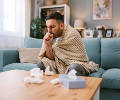 Man,Dealing,With,Flu,Symptoms,,Coughing,And,Staying,Warm,On Man,Dealing,With,Flu,Symptoms,,Coughing,And,Staying,Warm,On
